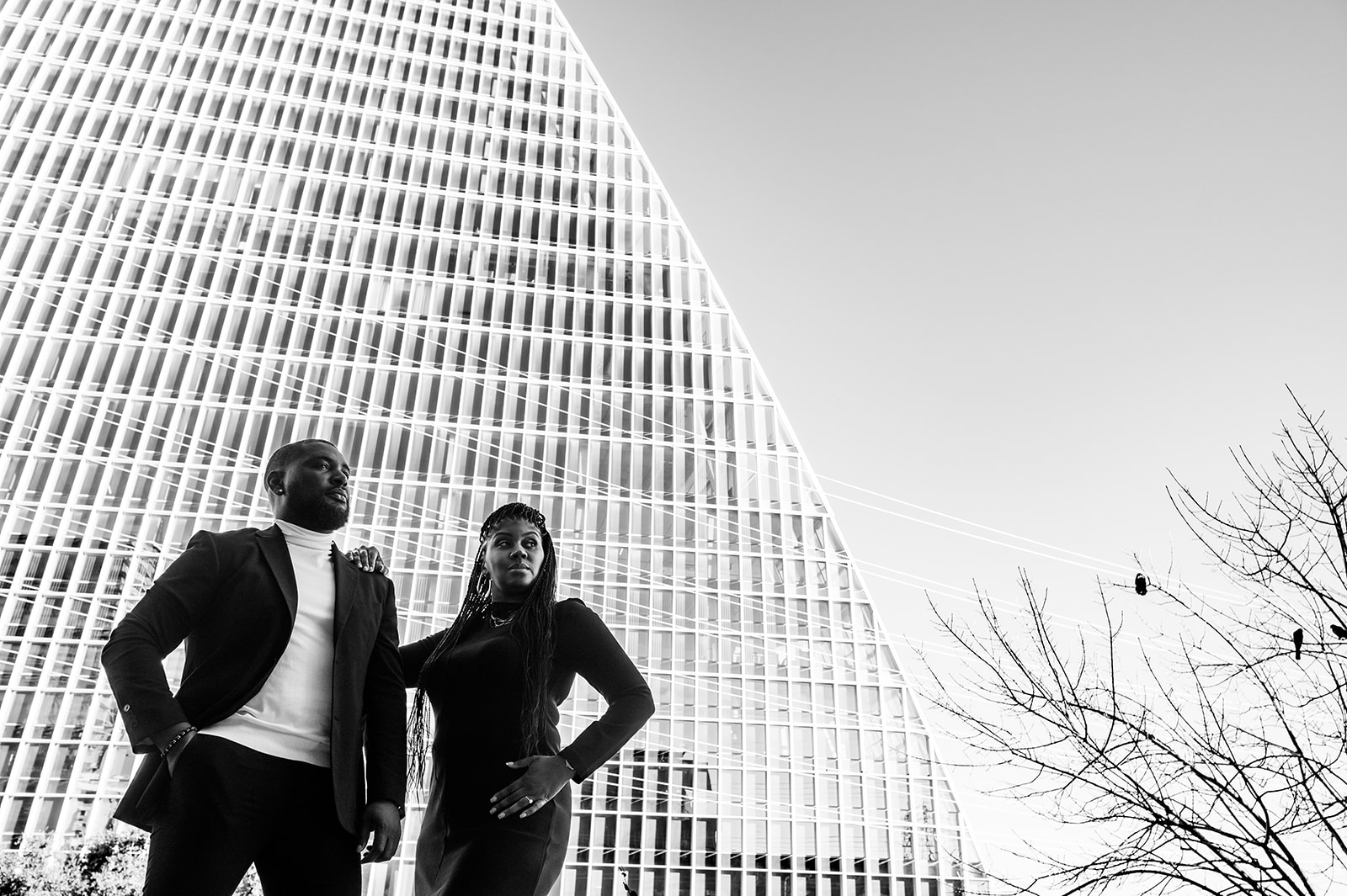 A Black engaged couple poses for their engagement photography session in Austin, TX