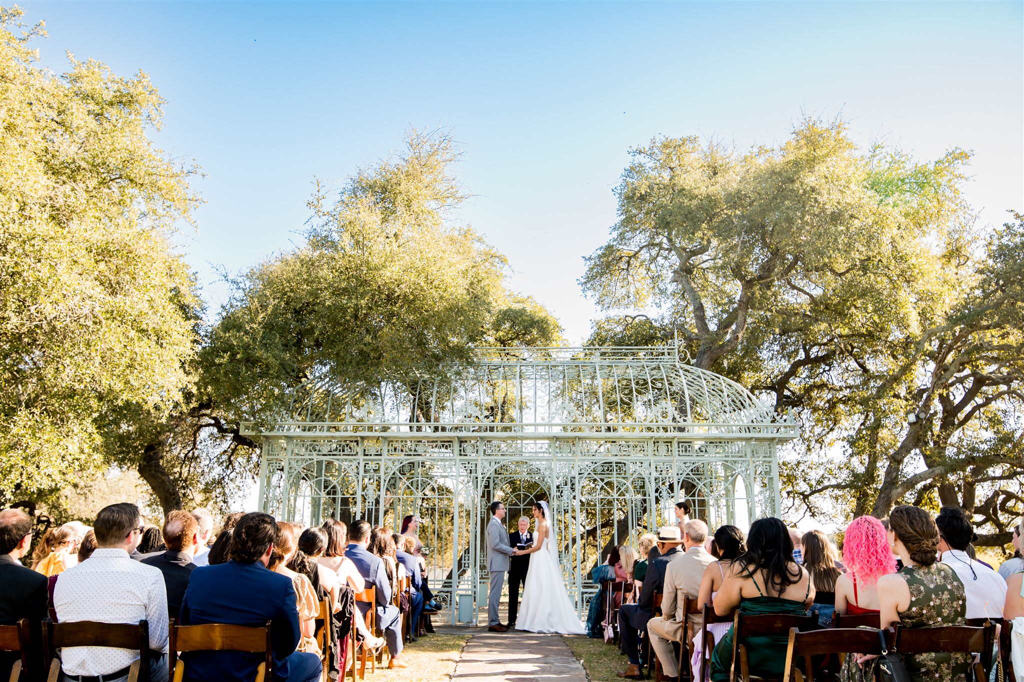 A bride and groom get married at Ma Maison wedding venue